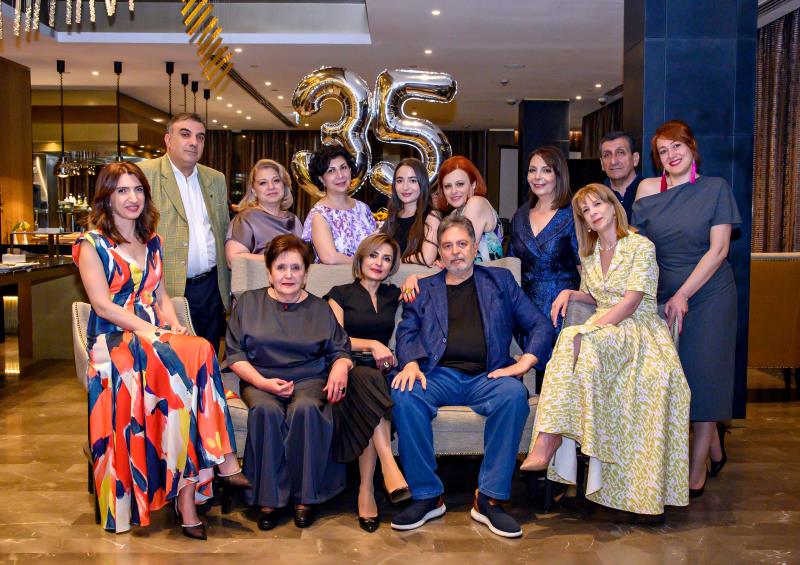 staff of levon travel and its founder Garbis Titizian during 35h anniversary celebration